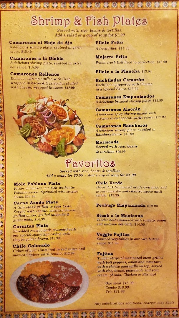 Colorful dishes beside salsa, rice, and tortillas.