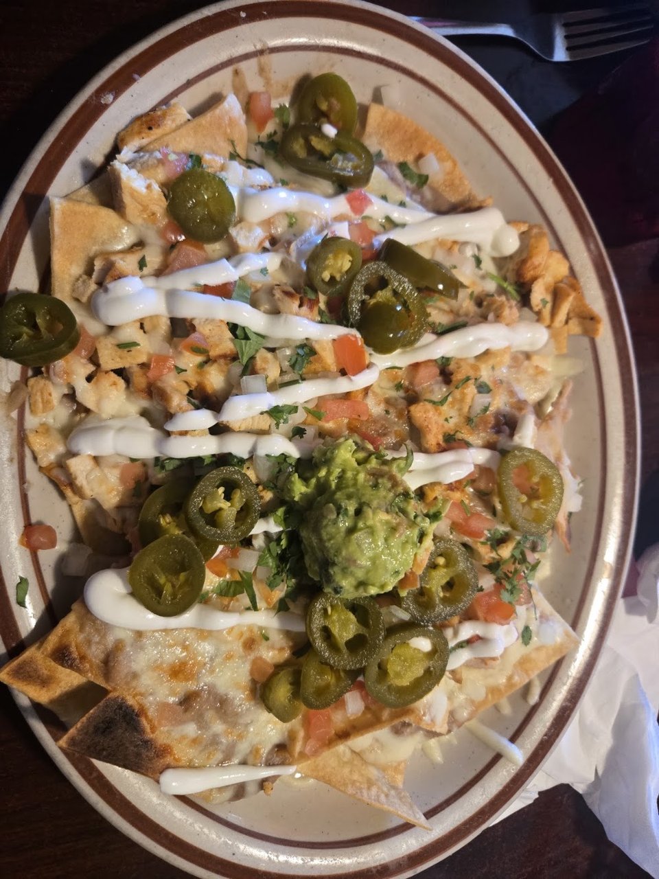 Restaurant menu listing Mexican favorites and breakfast items.